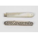 A George IV hallmarked silver bladed pen knife with elaborately floral and foliate scroll decorated