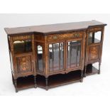 A late Victorian rosewood and satinwood inlaid chiffonier base of breakfront form with glazed