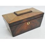 An early Victorian rosewood sarcophagus shaped tea caddy with circular mother of pearl escutcheon,