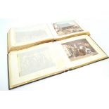 Two 19th century lacquer covered photograph albums with hand-painted decoration,