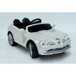 A unique child's ride-in toy car modelled as a Mercedes SLR 722S,