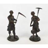 A pair of early 20th century Continental spelter figures of male and female agricultural workers