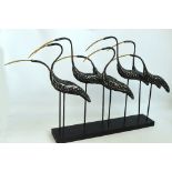 A decorative bird sculpture "Group of Egrets",