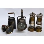 Two mid 20th century miner's lamps, a bicycle lamp, and three further lamps (6).