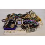 A large quantity of costume jewellery including beaded necklaces, earrings,