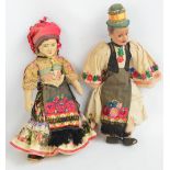 Two early 20th century dolls in national costume, possible a Balkan country, height approx 40cm.