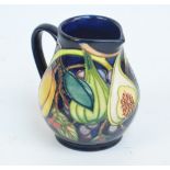 A modern Moorcroft jug in "Queen's Choice" pattern, designed by Emma Bossons,