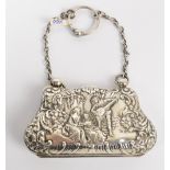 An Edward VII hallmarked silver purse embossed with fête champêtre scene to one side,