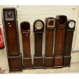 Seven 20th century grandmother clocks in various states of repair,