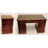 A 20th century mahogany pedestal desk with one long and two short drawers at the top,