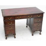 An early 20th century pedestal desk,