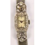 A lady's vintage Art Deco platinum and diamond set cocktail watch on adjustable mesh bracelet and