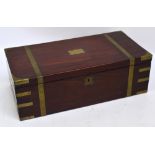 A Victorian mahogany brass bound writing slope, centred with a shaped vacant cartouche,