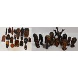 A collection of 20th century carved wooden African busts, also several masks.