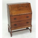 A 1920s oak bureau.