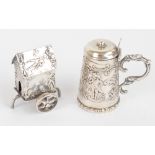 A late 19th/early 20th century German pseudo-Hanau silver miniature tankard embossed with two