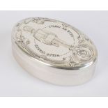 An Elizabeth II hallmarked silver box of oval form with detachable lid embossed with beefeater,