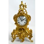 A 1950s decorative gilt metal mantel clock,