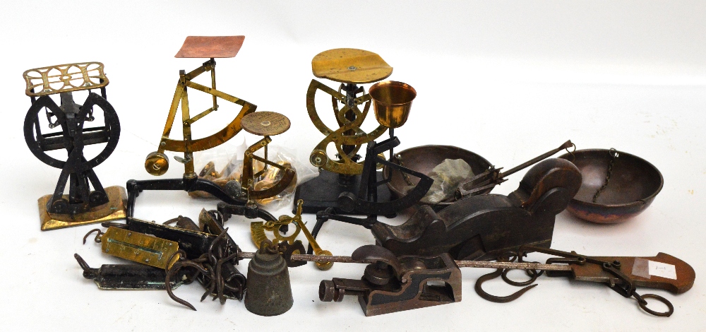 Two vintage planes, a group of spring balances, a graduated set of bell weights,