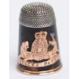 A cased 19th century tortoiseshell and gold "Piercy's Patent" thimble, length 2.3cm.