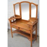 A pine triple mirror back dressing table with two drawers and lower shelf, width 100cm.