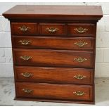 A reproduction five drawer chest of drawers with brass handles, width 93cm.