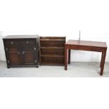 A modern mahogany side table with two small drawers on block supports,