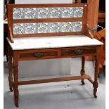 A late Victorian marble top wash stand with tile splashback, width 106cm.