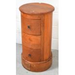 A circular chest of drawers with three drawers, height 79cm.