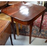 A late George III mahogany and inlaid tea table, hinged top above square section tapering legs,