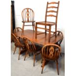 An Ercol refectory style dining table, length approx 155cm,