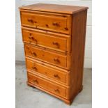 A modern pine five drawer chest of drawers, approx width 76cm.