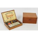 A small wooden paint box,