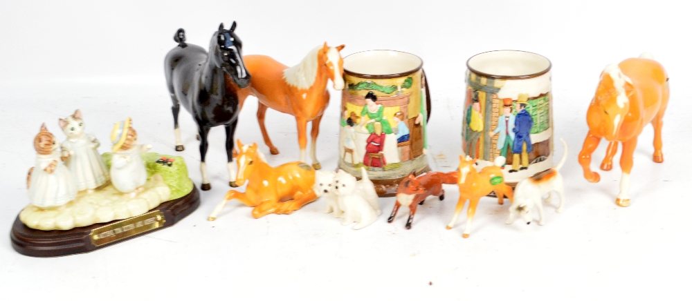 A quantity of Beswick items comprising two standing Palomino horses,