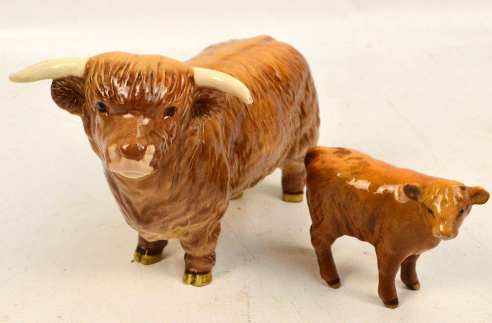 Two Beswick figures; a Highland bull and a Highland calf (2).