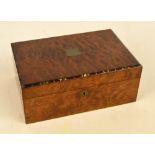 A 19th century rosewood sewing box with lozenge shaped ivory escutcheon and vacant cartouche to the