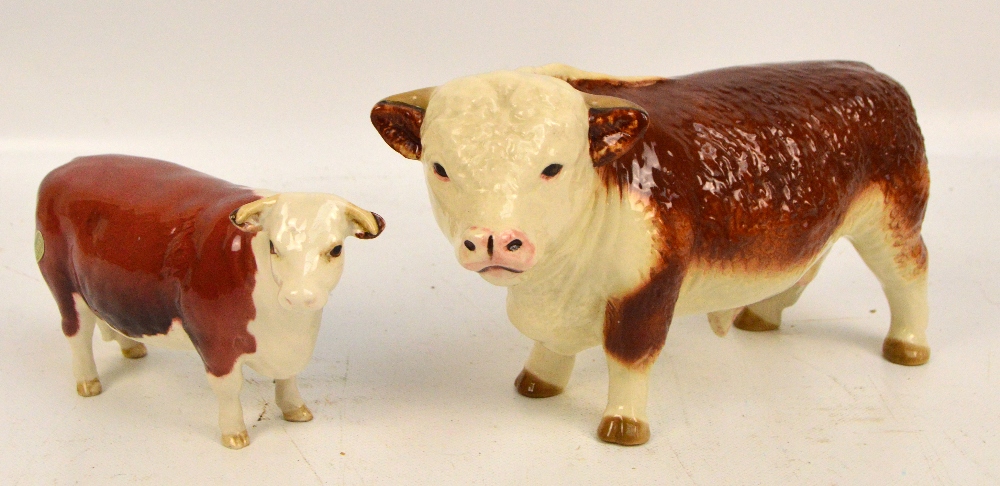 Two Beswick figures; a Hereford bull and a Hereford cow "Ch. of Champions" (2).