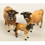 Three Beswick figures; a Jersey bull "Ch. Dunsley Coy Boy", a Jersey cow "Ch.