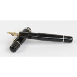 A Bexley black bodied Magnum fountain pen, with 18ct two tone gold nib, length 13.8cm.
