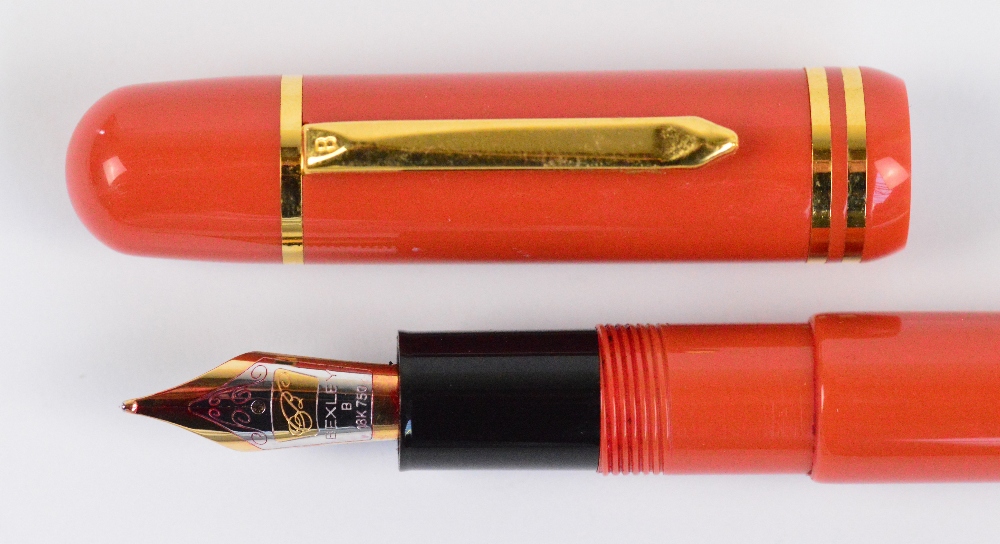 A Bexley Poseidon Magnum fountain pen with orange body, plated mounts and 18ct two tone gold nib, - Image 3 of 4