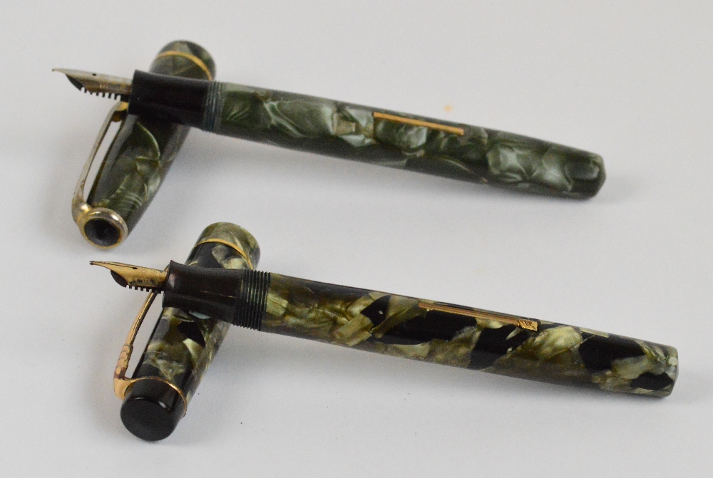 A Burnham B48 fountain pen with green marbled body, length 13cm,