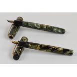 A Burnham B48 fountain pen with green marbled body, length 13cm,