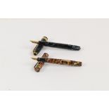 A Conway Stewart 58 fountain pen with blue and black marbled body and 14ct yellow gold nib,