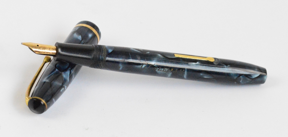 A Conway Stewart 15 fountain pen with blue marbled body and 14ct yellow gold nib,