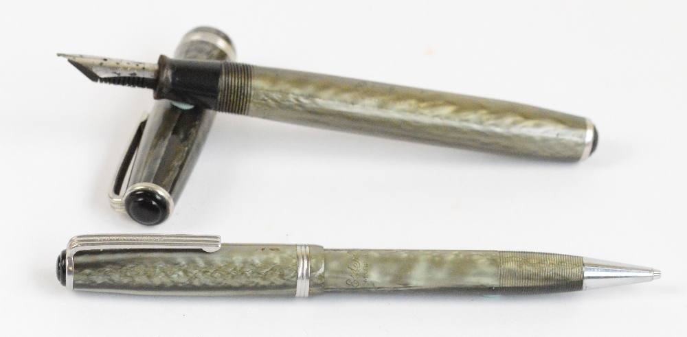 An Esterbrook fountain pen and pencil set in grey/light green pearl body,