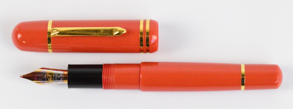 A Bexley Poseidon Magnum fountain pen with orange body, plated mounts and 18ct two tone gold nib, - Image 2 of 4