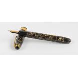 A Conway Stewart Executive 60 fountain pen with hatched brown marbled body and 14ct gold duro nib,