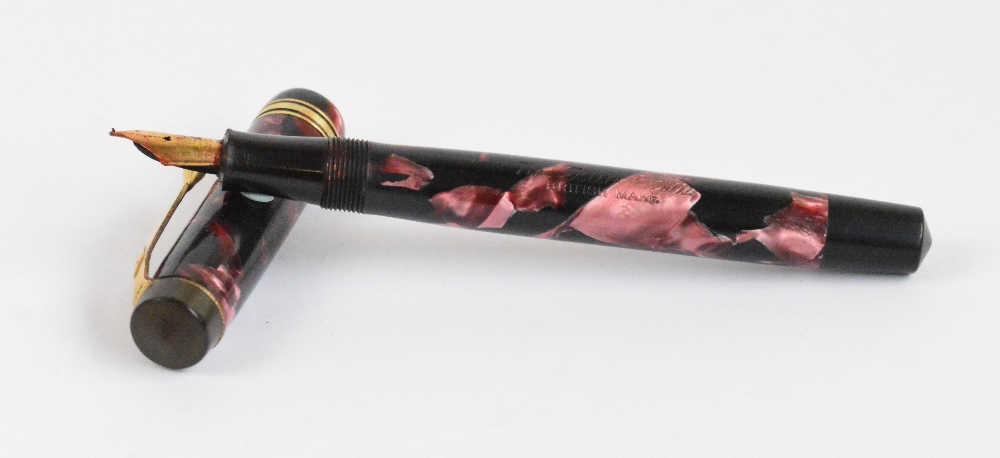 A "The Burnham" fountain pen with pink and black marbled pearl body, and 14ct gold nib, length 13.