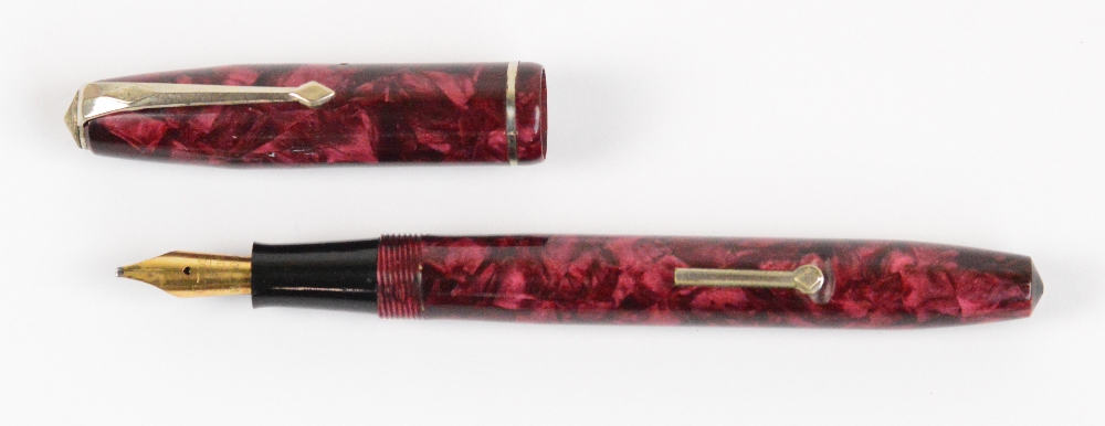 A Conway Stewart 75 fountain pen with rose pearl marbled body and 14ct yellow gold nib, length 12. - Image 2 of 3