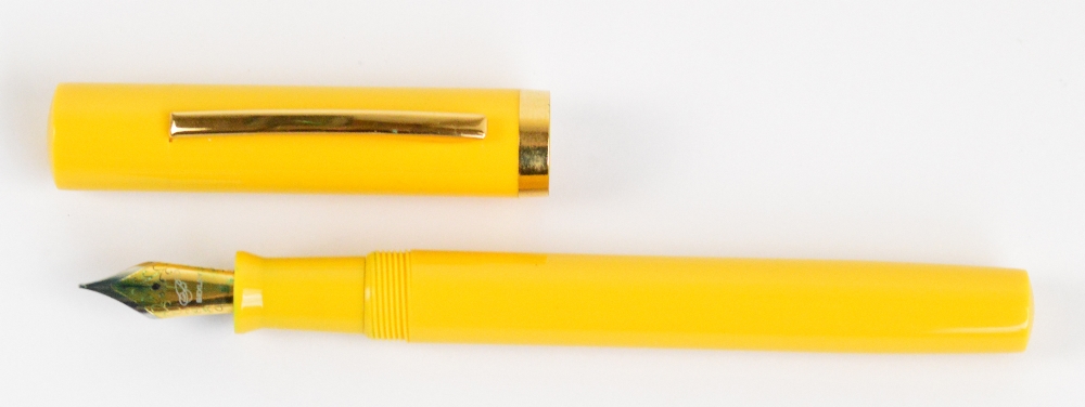 A Bexley fountain pen with mandarin yellow body and plated mounts, length 15.3cm. - Image 2 of 3